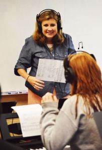 Mrs. Statom incorporates the new equipment into her lesson