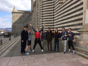 Smiling through the bitter chill of the walled city, Orvieto